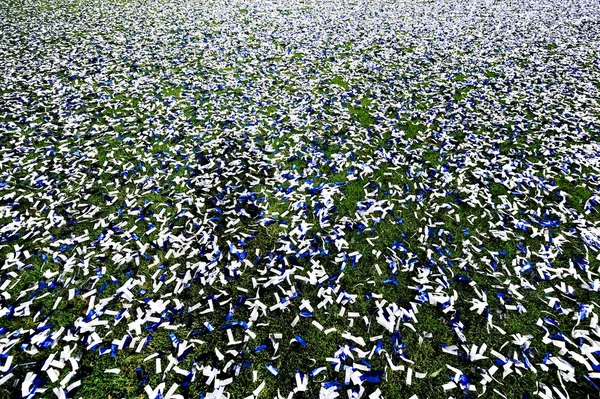 Confetti on a soccer field — Stock Photo, Image