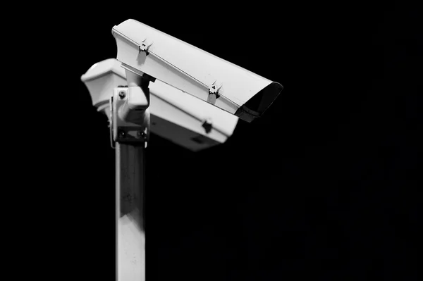 Surveillance cameras on black background Royalty Free Stock Images