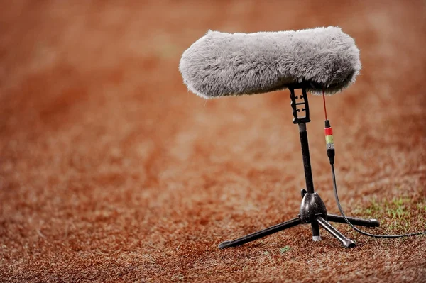 Microphone on sport field — Stock Photo, Image