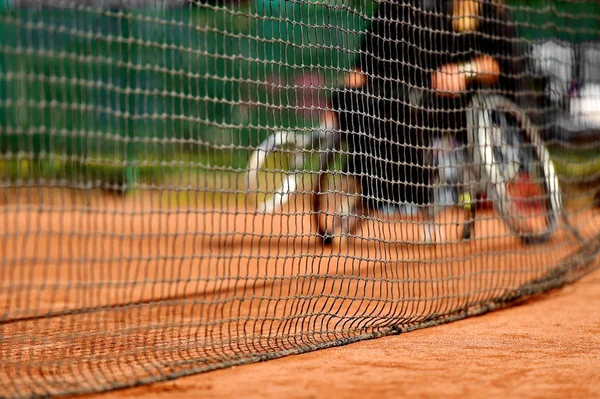 People in wheelchair playing tennis — Stock Photo, Image