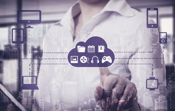 Businesswomen  touching a cloud connected to many objects on a virtual screen, concept about internet of things