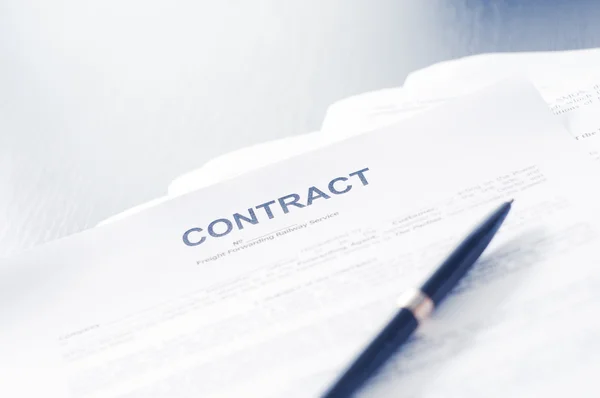 Contract on a wooden desk fountain pen — Stock Photo, Image