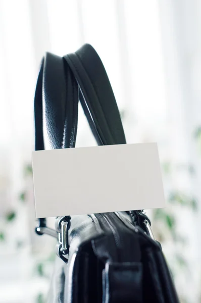 Business card on a leather bag — Stock Photo, Image