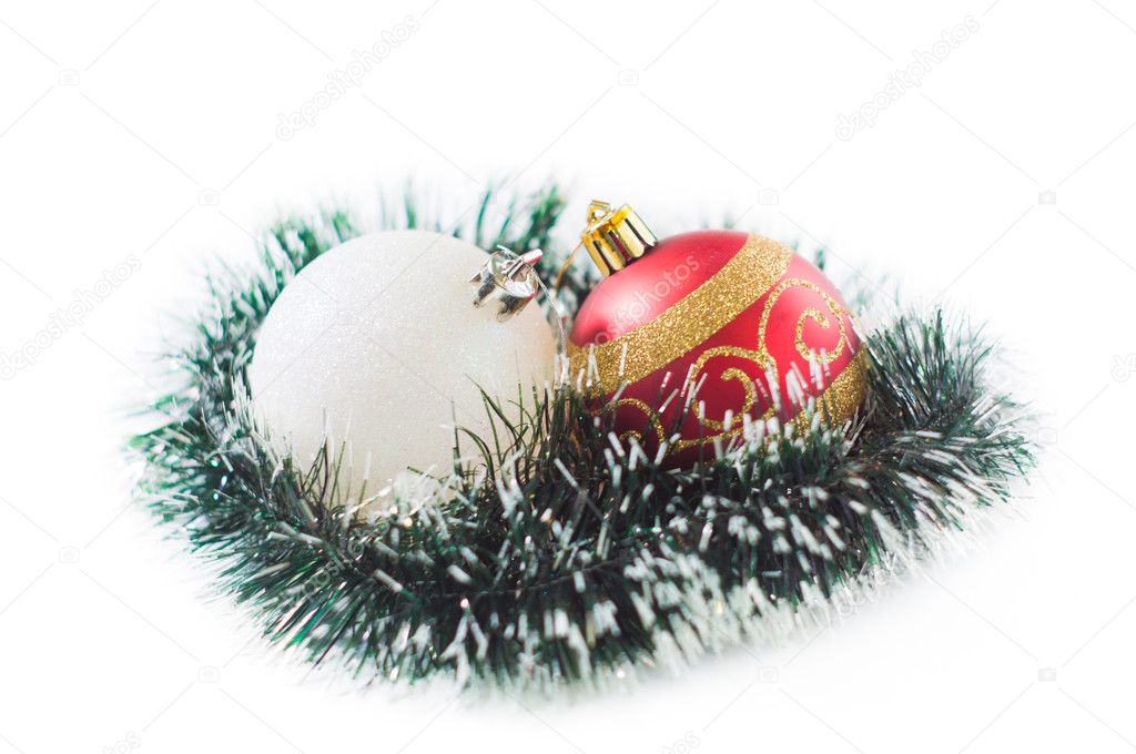 New Year's and Christmas balls with cones on white background