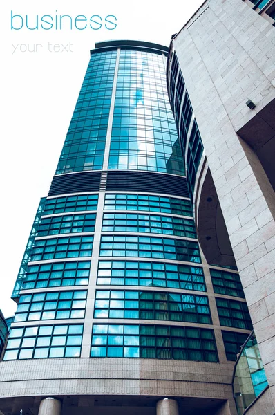 Perspective and underside angle view to textured background of modern glass building skyscrapers — Stock Photo, Image