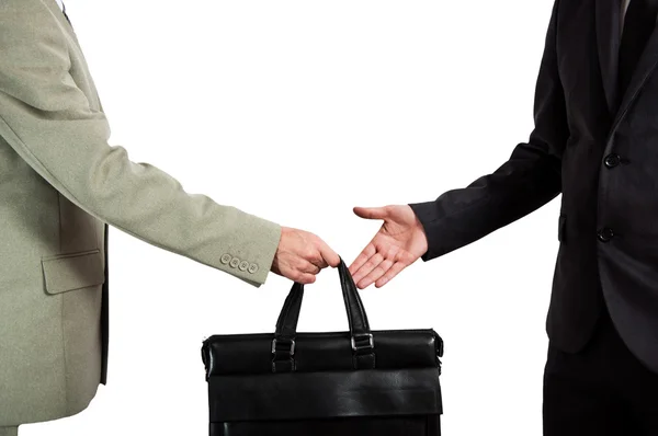 Business transfer. handover of a suitcase partners — Stock Photo, Image