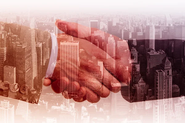 Handshake businessmen in the city background. Double exposure — Stock Photo, Image