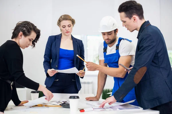 business, technology and office concept, a team of four engineer