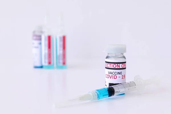 Different corona virus vaccine injection vials medicine vials. Covid-19 2019-ncov Sars-cov-2 Vaccination, immunization, different developments for treatment to cure Covid 19 Corona virus infection. Medical and healthcare concept.
