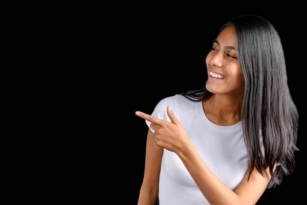 Beautiful Latin Woman Black Background Pointing Her Index Finger Smiling — Fotografia de Stock