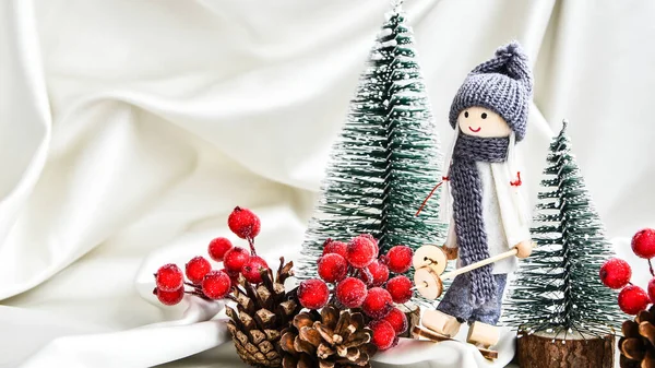 Christmas Composition Doll Skiing Fir Trees Festive Decorations Silk Christmas — Stock Photo, Image