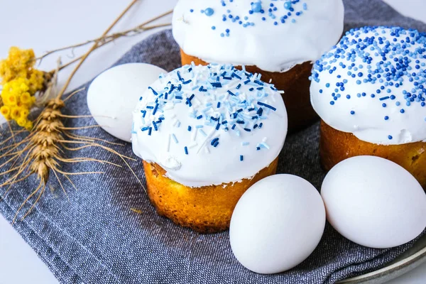 Happy Day Bright Easter. Orthodox Easter holiday. Traditional food. Creative stylish trend Homemade easter cake and eggs. Selective focus. Kulich Festive easter background Minimalism