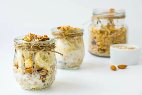 Healthy Breakfast Oatmeal Granola Greek Yogurt Nuts Banana Muesli Jars — Stock Photo, Image