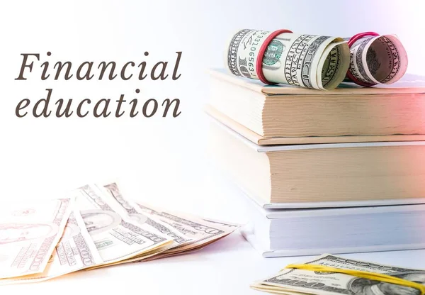 Financial education Knowledge leads to wealth. Stack of books with dollars. Concept of expensive education. Money in books. Saving money for college univercity. Savings, paid tuition
