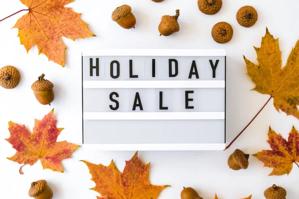 Lightbox with text HOLIDAY SALE around autumn fall leaves, Sale shopping concept. Online shopping Template Black friday sale mockup fall thanksgiving promotion advertising Big sale. Cyber monday. Holiday