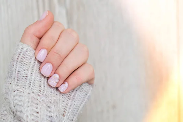 Closeup elegant pastel natural modern design manicure. Female hands. Gel nails. Nude manicure. Beige color. Skin care. Beauty. Nail care — Stock Photo, Image
