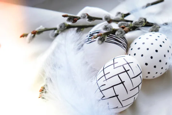 Trendy colored stylish Natural easter eggs, feathers, pussy willow branches on rustic cloth on white silk fabric. Flat lay. Easter still life — Foto Stock