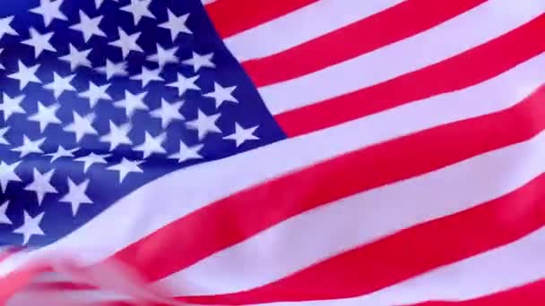 4k Viftande amerikansk flagga bakgrund. Amerikas förenta staters flagga. Fjärde juli självständighetsdagen. USA patriotism nationell helgdag. Usa stolt. — Stockvideo