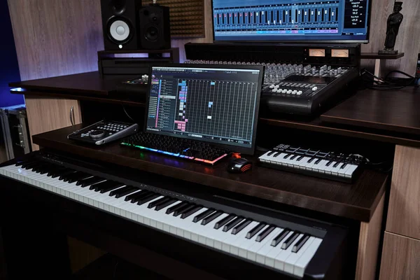 Recording studio equipment. Midi synthesizer with screen keyboard and loudspeaker for creating music