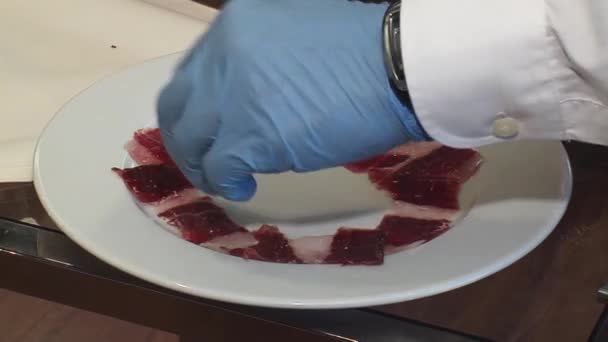 Closeup White Plate Iberian Ham Pieces Placed Circular Shape Hand — Stockvideo