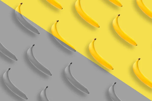 Banana pattern on yellow and gray background.
