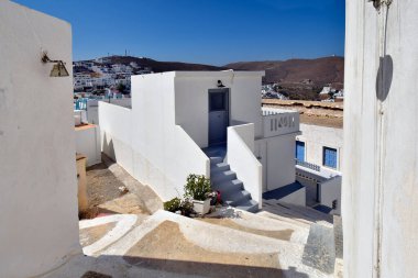 Astypalea, Greece -  Chora, the stunning white town and a typical alley with steps in the old town 
