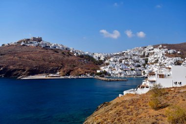 Astypalea, Greece - September 04, 2025:  The picturesque little town of Chora with port and windmills  on the Dodescanese island in Aegean Sea