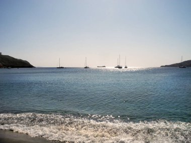 Greece, Astypalea Island, sunshine and blue skies, a holiday paradise for the anchored sailboats in Livadi Bay