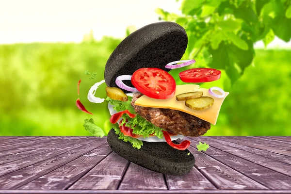 Černý Hamburger Létajícími Ingrediencemi Červeném Pozadí — Stock fotografie