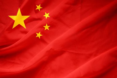 Çin ulusal bayrağı rüzgarda dalgalanıyor. Çin Cumhuriyeti 'nin kırmızı ipek standardına yakın, sarı yıldızlı. Çin Halk Cumhuriyeti arka plan renkleri.
