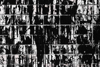 Eski tuğla duvar, arka plan için kullanılan erimiş reçineyle kaplanmış.