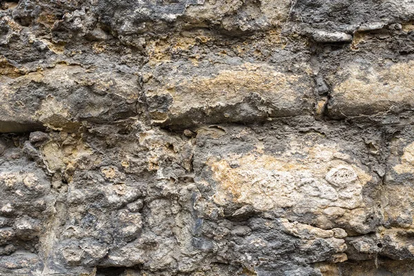 Fragment de mur d'une pierre ébréchée — Photo