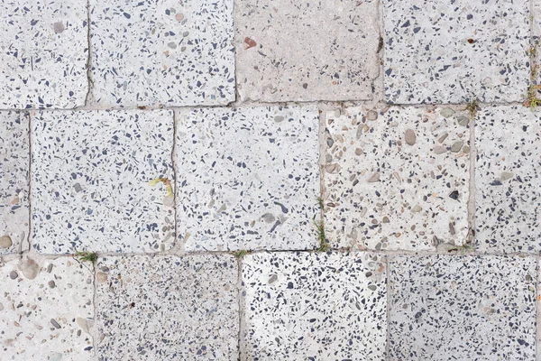 Graue Pflasterplatten in Großaufnahme. Abstrakter Hintergrund — Stockfoto