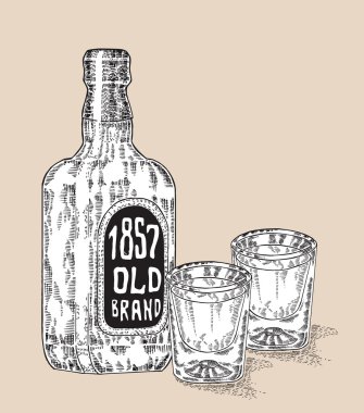 Bir şişe viski içecek. El iki bardak viski çekilmiş. Oyulmuş