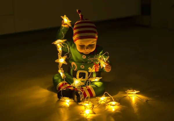 Santa helper baby — Stockfoto