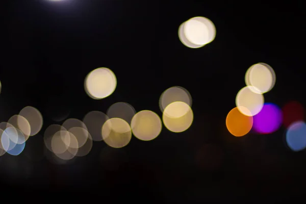 Gele zachte bokeh van lichten in de stad — Stockfoto