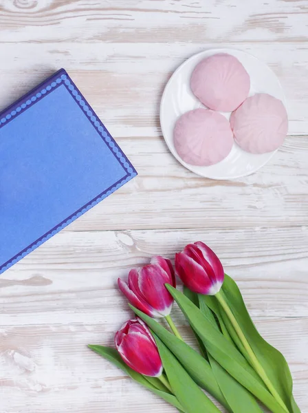 Blue Book Marshmallows Bouquet Pink Tulips White Wooden Table Top — Stock Photo, Image