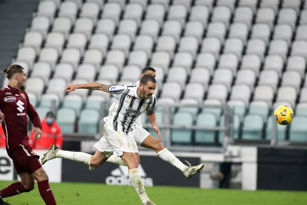 Dusan Vlahovic of Juventus and Christiano Biraghi of Acf Fiorentina during  the Italian serie A, football match between Juventus Fc and Acf Fiorentina  on 12 February 2023 at Allianz Stadium, Turin, Italy.