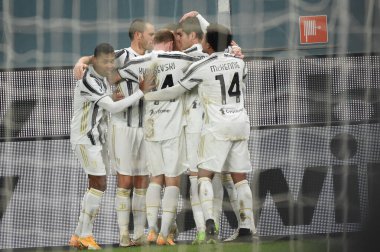 Juventus takımı, Genova, İtalya 'da 13 Aralık 2020' de oynanan Cenova - LM / Danilo Vigo maçında Cenova CFC 'nin Juventus FC' ye karşı attığı golü kutluyor.