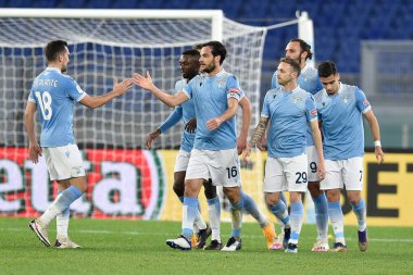 ROME, ITALY - 21 Ocak: SS Lazio 'dan Marco Parolo (16 Ocak), SS Lazio ile Parma arasında 21 Ocak 2021' de İtalya / LiveMedia 'da oynanan Stadio Olimpico' da oynanan 8. TIM Kupası maçında gol attıktan sonra kutluyor.