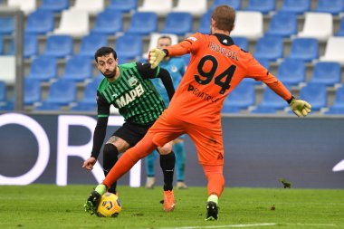 Francesco Caputo (Sassuolo) ve İvan Provedel (Spezia) İtalyan futbol takımı Serie A maçında ABD Sassuolo - AC Spezia maçını Reggio Emilia, İtalya 'daki MAPEI Stadyumu' nda oynadılar, 06 Şubat 2021 - Kredi: LiveMedia / Alessio Tarpini