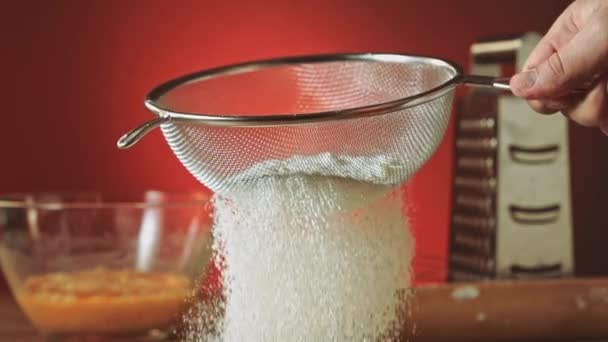 Sifting flour through sieve — Stock Video