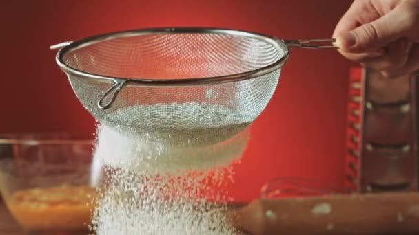 Sifting flour through sieve — Stock Video