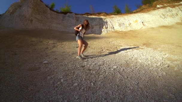 Woman hiking and climbing — Stockvideo