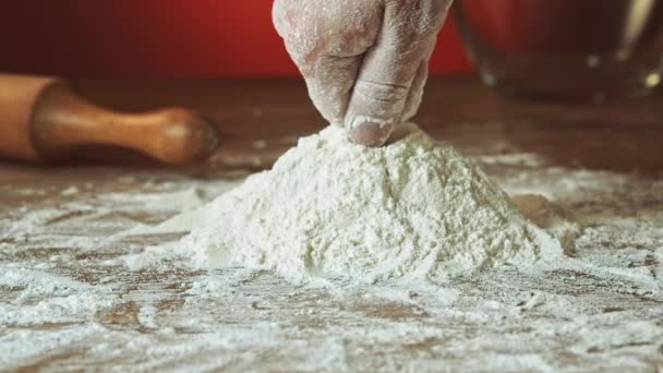 Hand preparing flour — Stock Video