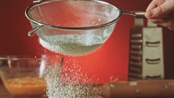 Sifting flour through sieve — Stock Video