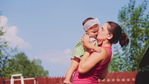 Mother playing with baby daughter — Stock Video