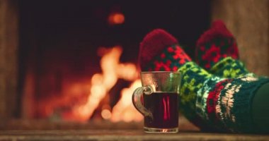 Woman relaxes with a cup of tea