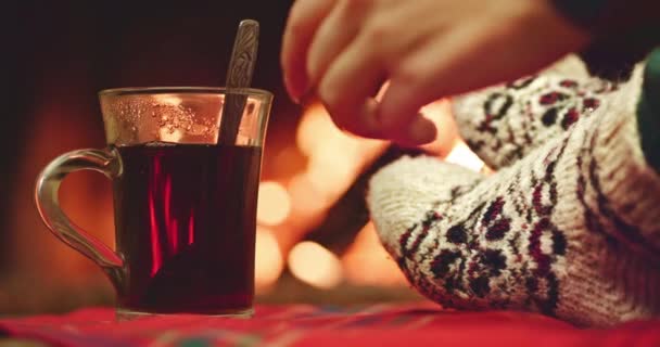 Woman stirs hot drink with teaspoon — Stock Video