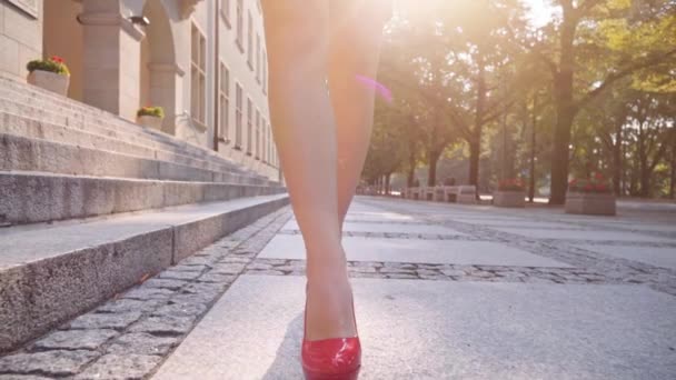 Sexy woman legs in red shoes — Stock Video